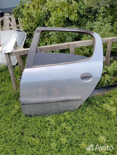 Дверь задняя левая пежо 206