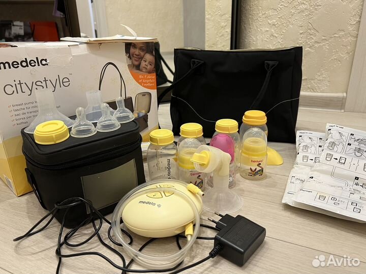 Молокоотсос medela