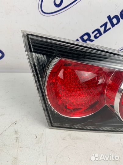 Фонарь в крышку багажника задний левый Mitsubishi