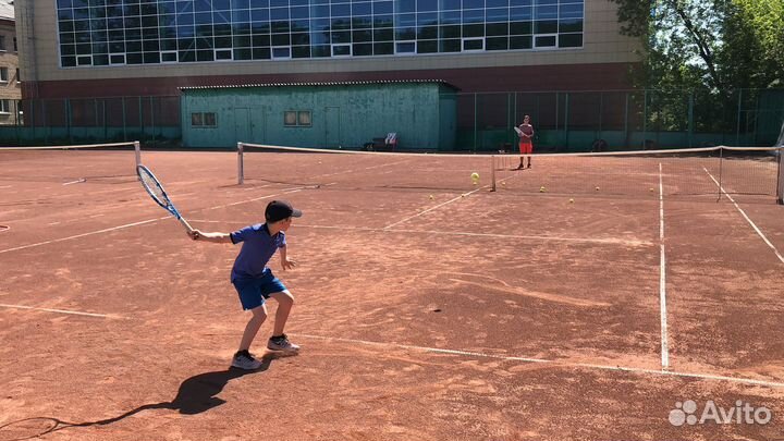 Тренер по большому теннису