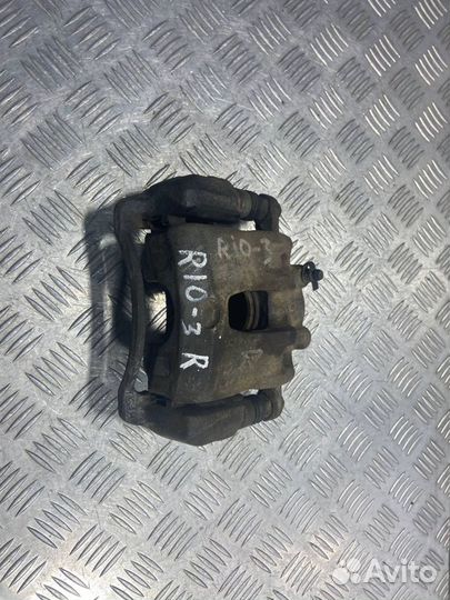 Суппорт передний правый KIA Rio 3