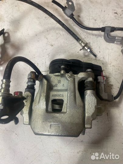 Суппорт тормозной задний правый Mitsubishi