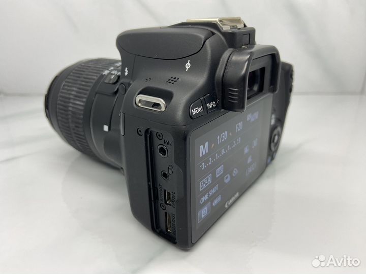 Зеркальный фотоаппарат Canon 100D + 18-55mm kit