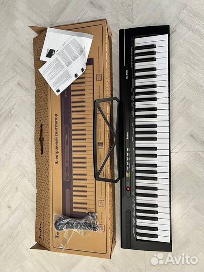 Синтезатор элегантный новый