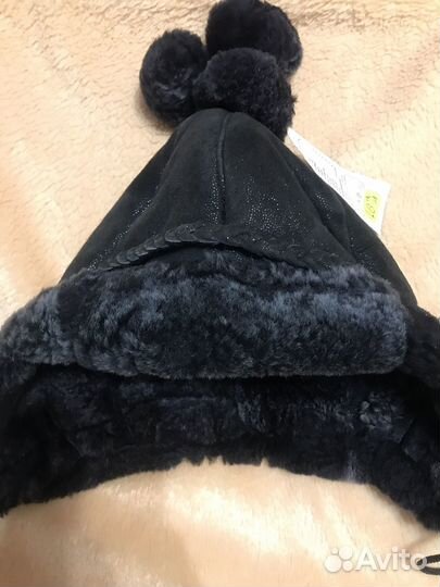 Новая детская шапка из овчины