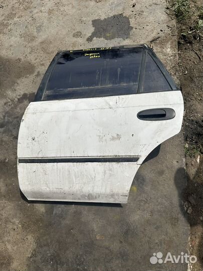 Дверь задняя левая Toyota Corolla AE-100