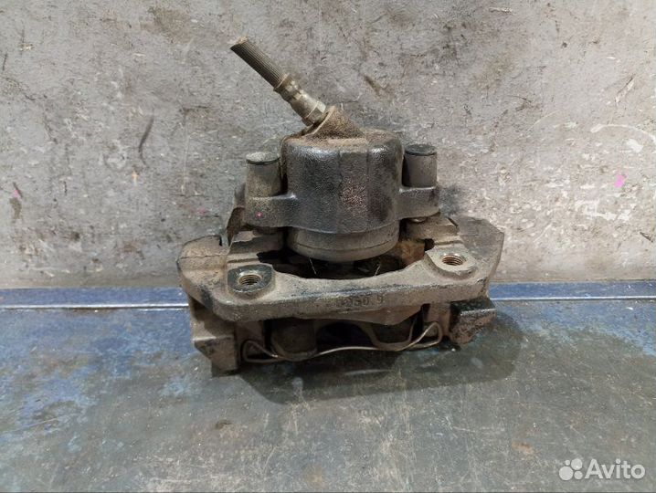 Суппорт передний Mazda Tribute EP