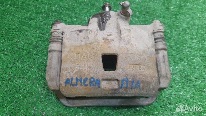 Суппорт передний левый Nissan Almera Classic 1.6