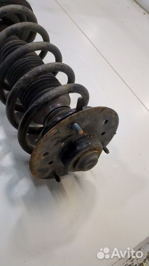 Амортизатор подвески левый передний Chevrolet Captiva