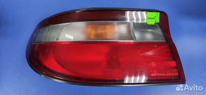 Фонарь левый задний toyota carina AT190