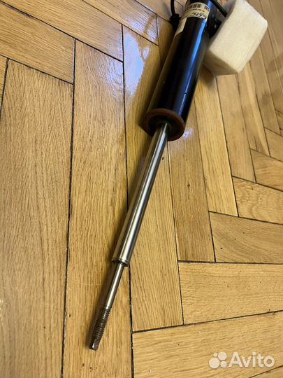 Амортизатор задний левый Cadillac SRX2