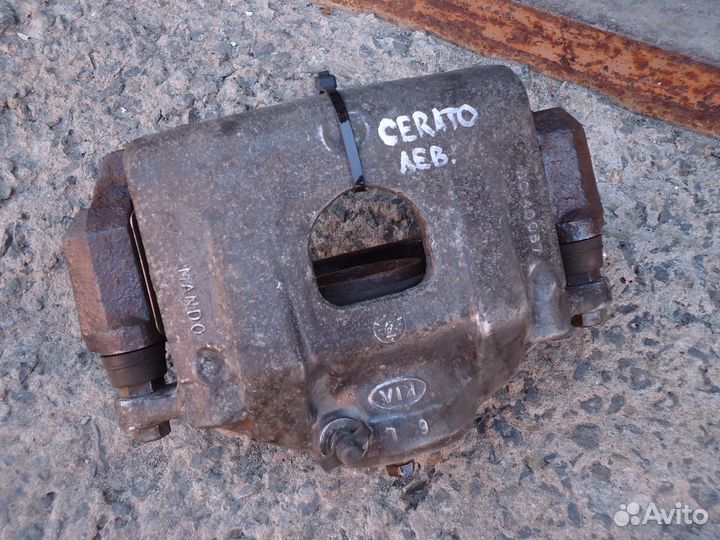 Суппорт передний левый Kia Cerato 2006-2008