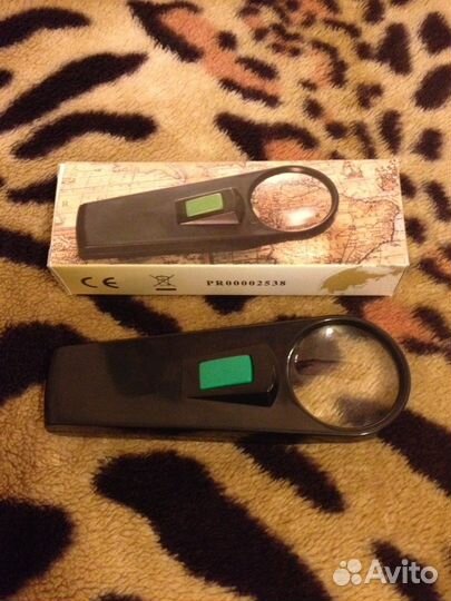 Увеличительное стекло с фонариком