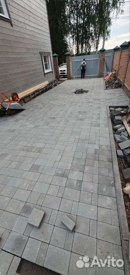 Укладка тротуарной плитки брусчатки бордюров