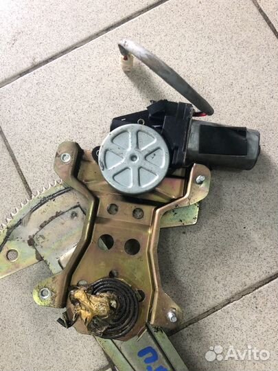 Моторчик стеклоподъёмника передний правый Lifan