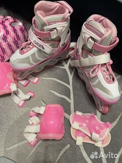 Роликовые коньки