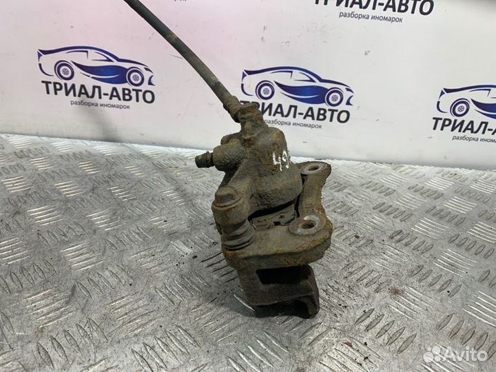 Суппорт задний правый Kia Sportage 3