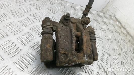 Суппорт тормозной задний левый toyota corolla E12