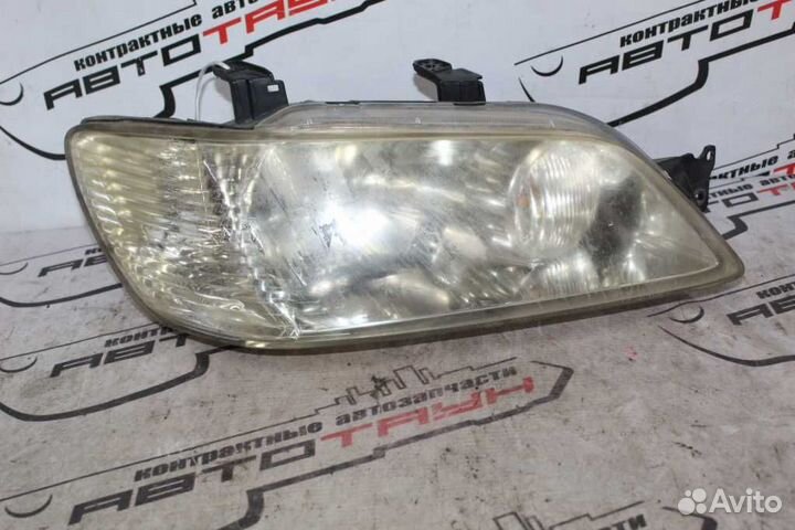 Фара mitsubishi lancer cargo lancer cedia CS2A CS2