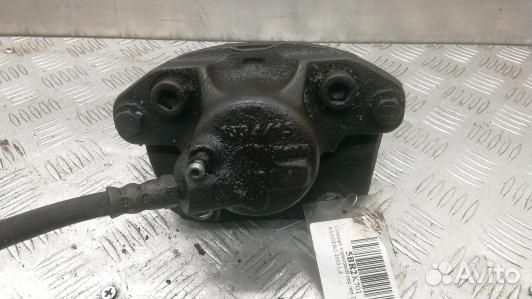 Суппорт тормозной передний левый dacia sandero 1