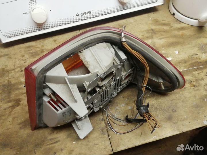 Фонарь наружный левый Мерседес 210