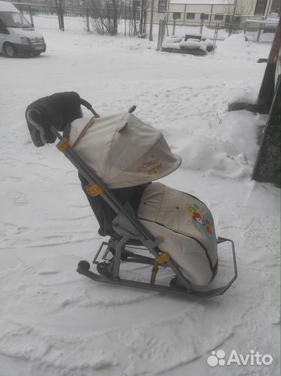 Детские зимние санки на колесах