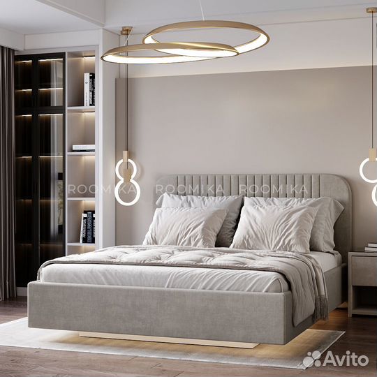 Кровать в мягкой обивке