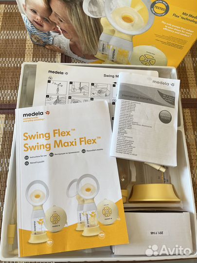 Молокоотсос medela swing maxi flex двойной
