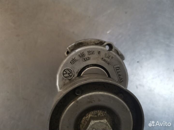 Натяжитель приводного ремня VAG 1,4TSI 03C145299Q