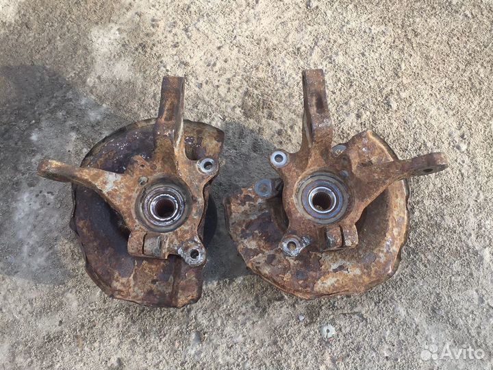 Лансер 9 поворотные кулаки