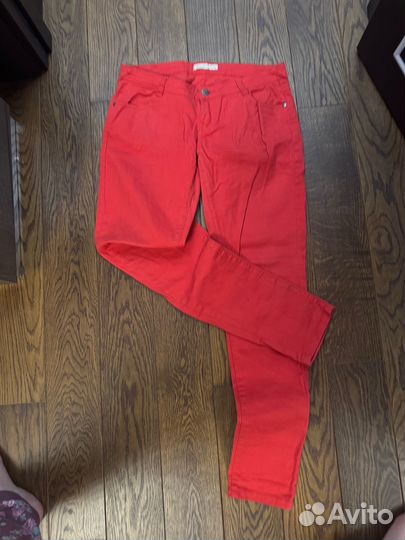 Оранжевые джинсы