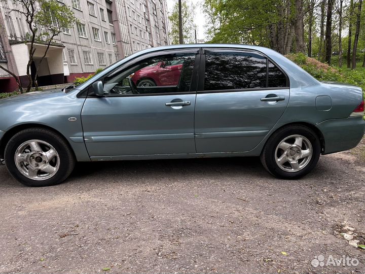 Mitsubishi Lancer 1.6 МТ, 2006, 245 000 км