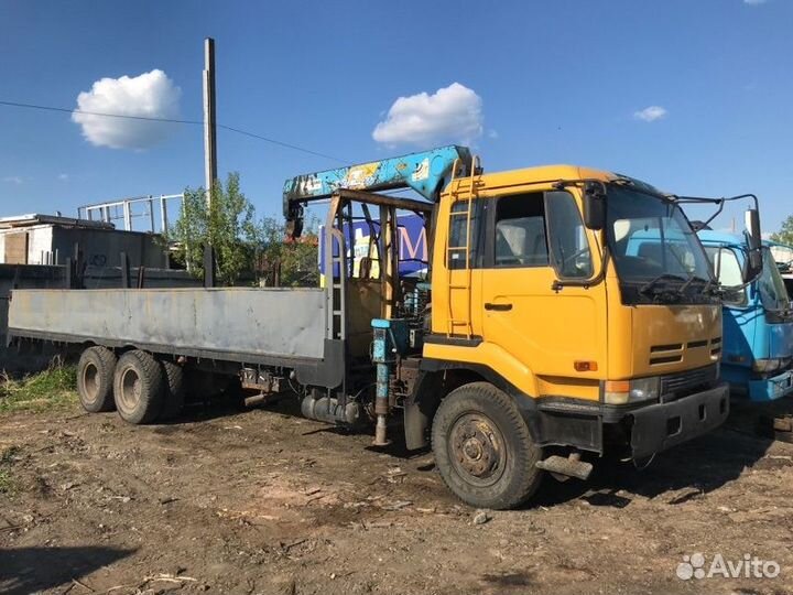 Продаем Nissan Diesel CW520 кранборт по запчастям