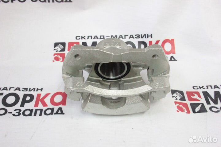 Суппорт тормозной передний правый Toyota Corolla