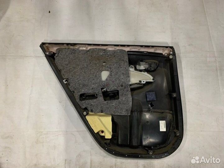 Обшивка двери задняя правая Toyota Corolla 150