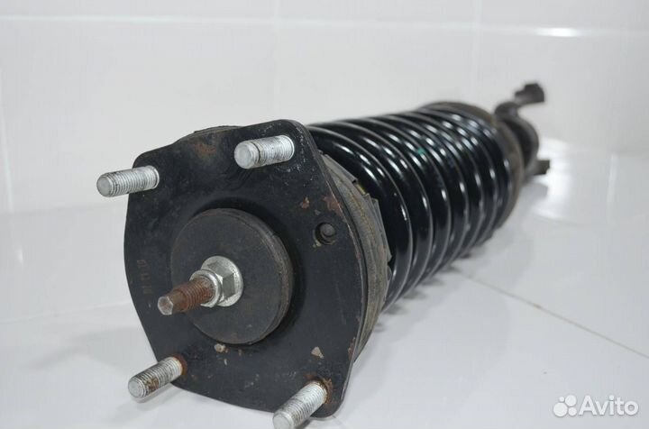 Стойка амортизатора передняя Jeep Grand Cherokee