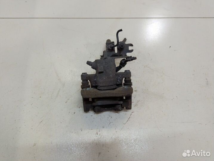 Суппорт левый задний Volkswagen Caddy, 2013