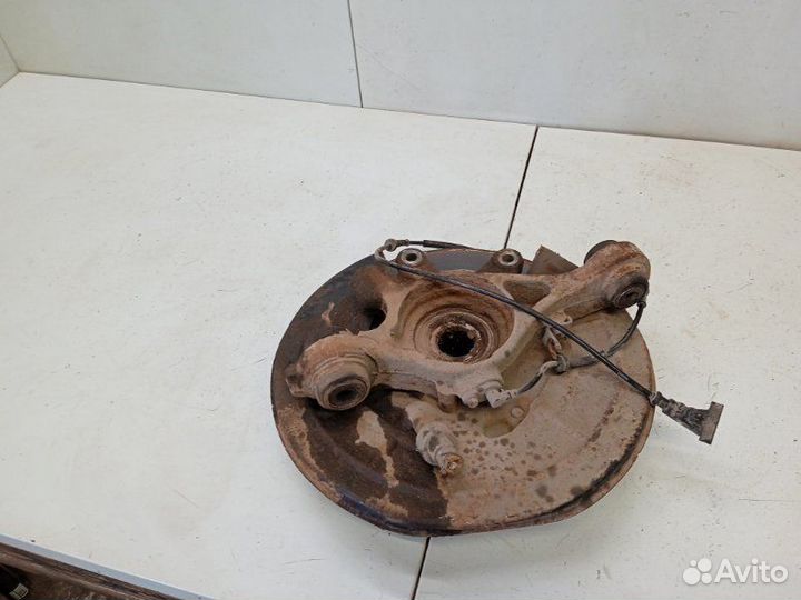 Кулак поворотный задний левый Land Rover Discovery