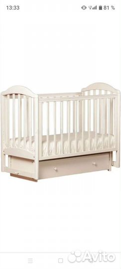 Детская кроватка с маятником и ящиком