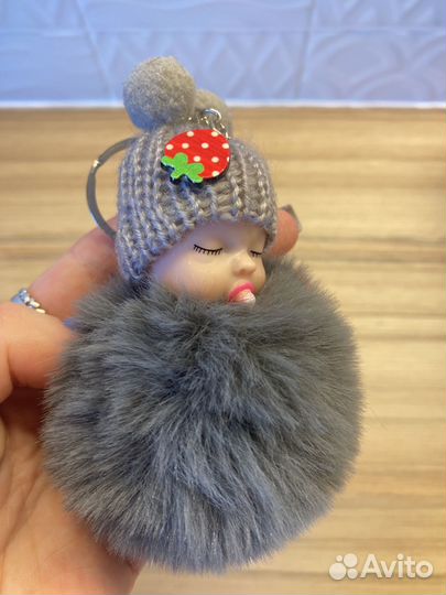 Пупс брелок меховой серый