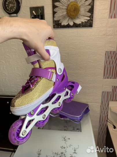 Роликовые коньки