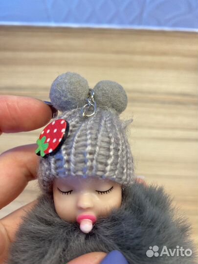 Пупс брелок меховой серый