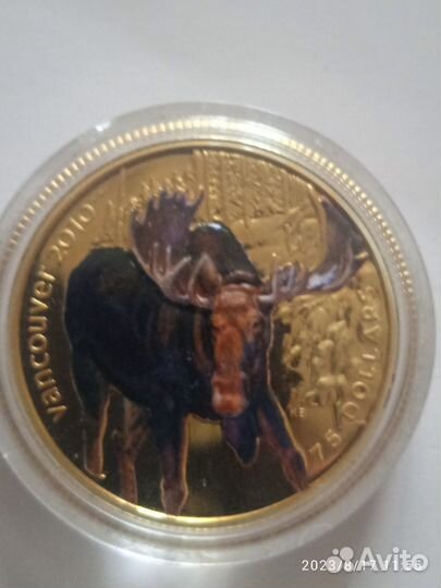 Золотая монета Канада