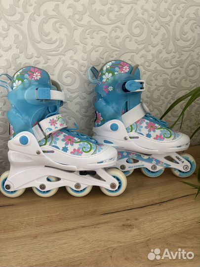 Продам регулируемые роликовые коньки(30-33)