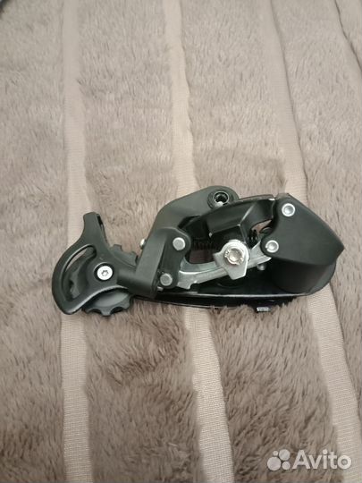 Задний переключатель скоростей на велосипед