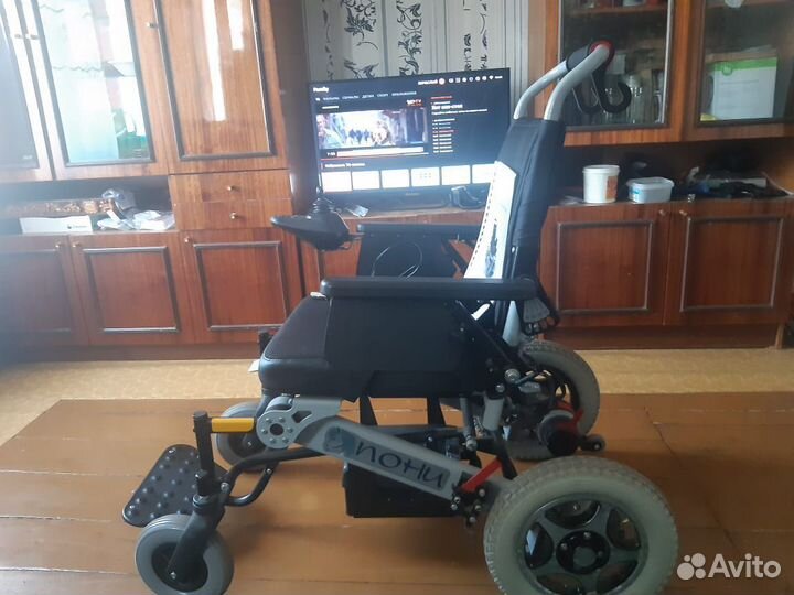 Инвалидная коляска с электроприводом