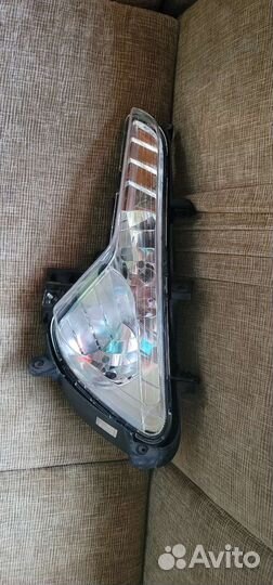 Левая противотуманка Kia Spotage