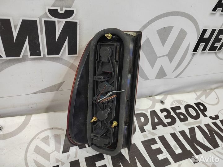 Фонарь задний Volkswagen Caddy 2