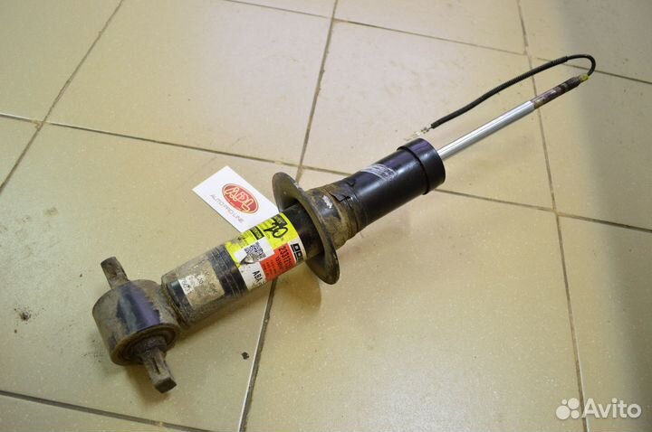 Передний амортизатор Cadillac Escalade 4 GMT K2