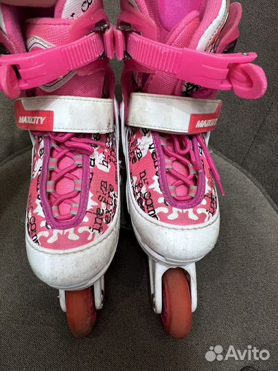 Роликовые коньки